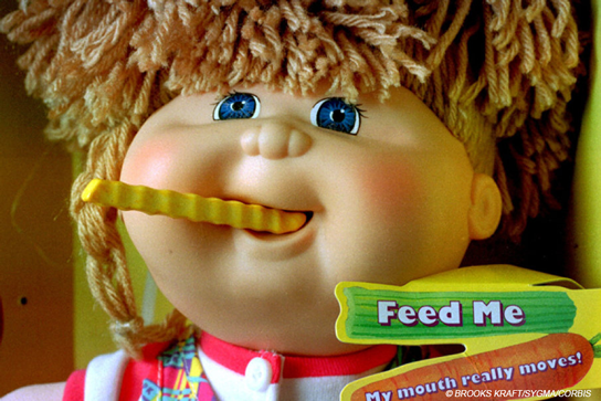 Snacktime Cabbage Patch Kid doll eating a fake french fry