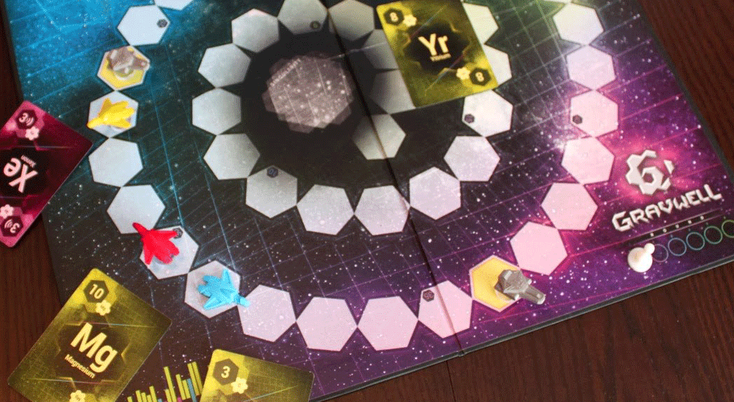 Gravwell board game board with yellow cards and spaceship figures