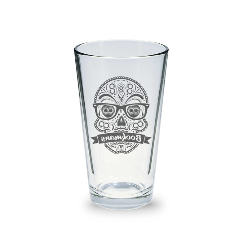 Bookmans pint glass with our sugar skull logo in black on the glass. Back view.
