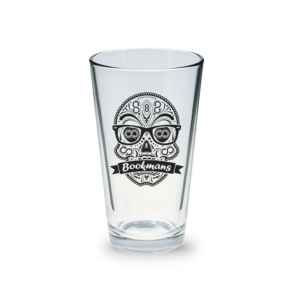 Bookmans pint glass with our sugar skull logo in black on the glass. Front view.