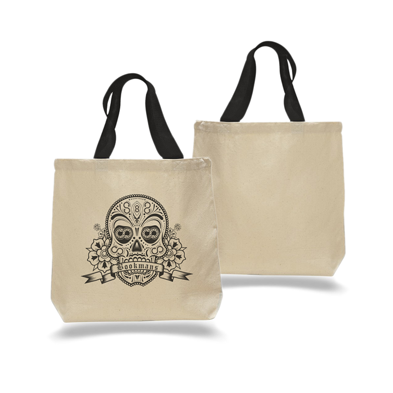 Bookmans sugar skull canvas tote bag featuring a black sugar skull bookmans logo on a cream tote bag with black handles. Front and back views side by side.