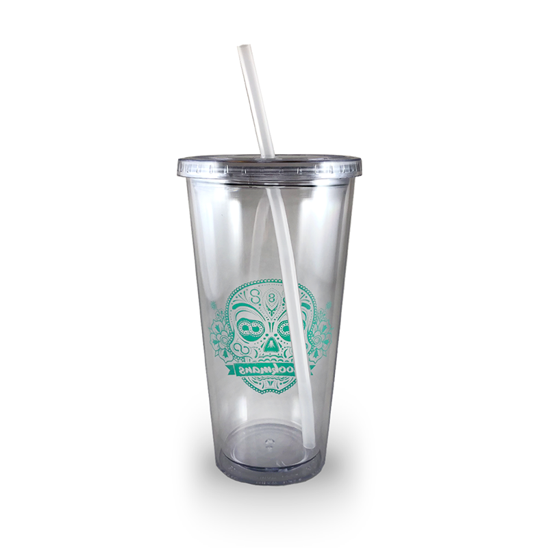 Bookmans clear, reusable tumbler with a screw-on lid and straw featuring the teal blue sugar skull logo. This item is plastic. Back view.